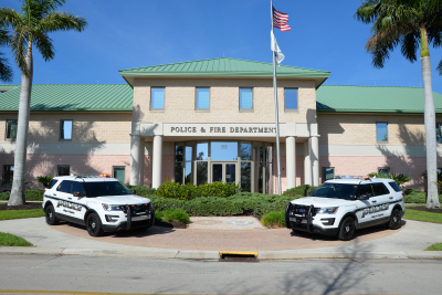 Police building with patrol cars